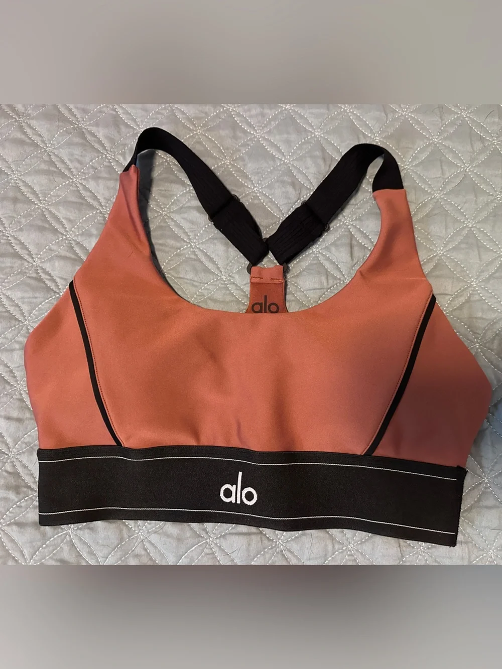 Alo Airlift Suit Up Sports Bra in a Rust with Black Trim
